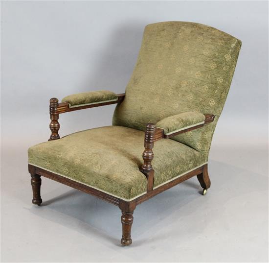 An Aesthetic movement oak armchair, in the manner of E.W. Godwin, W.2ft 3in. D.3ft H.2ft 10in.